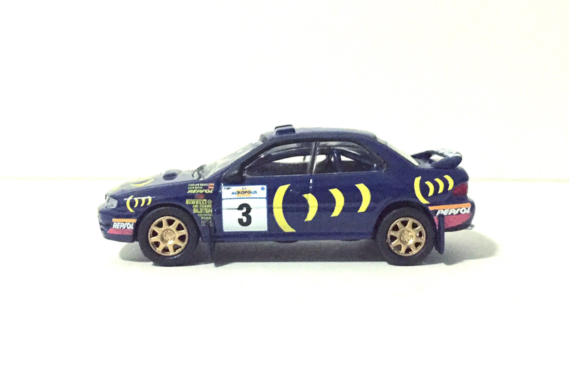 Illustration for article titled Subaru Impreza WRC 'Acropolis Rally' 1/64 by CM's Rally Car Collection